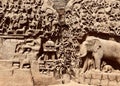 Bas relief rock cut sculptures of Gods, people and animals carved in monolithic rock Royalty Free Stock Photo