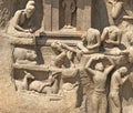 Bas relief rock cut sculptures of Gods, people and animals carved in monolithic rock Royalty Free Stock Photo