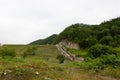 Descent from the lake located in the vicinity of the town of Kholmsk decorated with forest landscapes