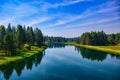 THE DESCHUTES RIVER RUNNING THROUGH SUNRIVER OREGON WITH A BEAUTIFUL REFLECTION IN THE RIVER Royalty Free Stock Photo