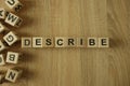 Describe word from wooden blocks Royalty Free Stock Photo