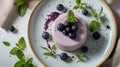 Describing a Dessert Plate with Birds Milk Cake, Blueberries