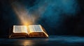 Illuminated open Bible with light rays and smoke on dark background Royalty Free Stock Photo