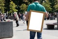 man holding a blank white board on his back Royalty Free Stock Photo