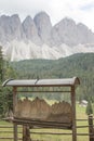 Descriptive billboard of the Odle Dolomites with the Dolomites in the background
