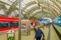 DESDREN, GERMANY - MARZO 23, 2016: Unidentified passengers arriving to train departure, nice roof