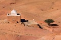 Desert and ancient Muslim shrine - viewed from Ait Benhaddou