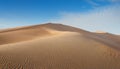 Desert concept, sand dune and blue sky Royalty Free Stock Photo