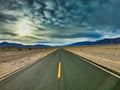 Travel in west america, death valley, lonley road, no cars driving Royalty Free Stock Photo