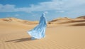 Desert editorial minimalist portrait of woman in headscarf for new clothing collection