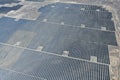 Desert fields filled with solar panels with solar tracking to maximize electricity generation Royalty Free Stock Photo