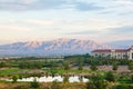 Desert Golf Resort with Purple Mountains in Distance Royalty Free Stock Photo