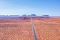 Desert highway leading into Monument Valley, Utah, USA Royalty Free Stock Photo