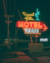 Desert Hills Motel vintage neon sign at night on Route 66 in Tulsa, Oklahoma