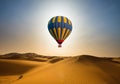 Desert and hot air balloon Landscape at Sunrise Royalty Free Stock Photo