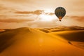 Desert and hot air balloon Landscape at Sunrise Royalty Free Stock Photo