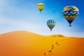 Desert and hot air balloon Landscape at Sunrise Royalty Free Stock Photo