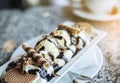 Desert ice-cream with waffels and tubules with chololate on top in cafe Royalty Free Stock Photo