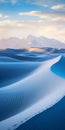 Exotic Landscapes: A Luminist Journey Through Blue Sand Dunes And Mountain Tops