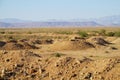 Desert landscape and mountains on horizon Royalty Free Stock Photo