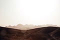 Desert landscape with stony hills and rocky mountains Royalty Free Stock Photo