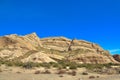 Desert landscape transitioning into dry rocky mountains