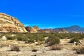 Desert landscape transitioning into dry rocky mountains