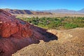 Desert landscape of village and volcanoes near San Pedro de Atacama, Chile, viewed from Pukara de Quitor, against a blue