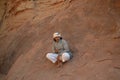 Bedouin guide at Desert tour through sand dunes of Wadi Rum wilderness, Jordan, Middle East, hiking, climbing, driving Royalty Free Stock Photo