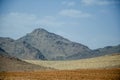 Desert landscapes in Morocco. Climate change and arid climate. Mountains and hills Royalty Free Stock Photo