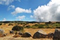 Desert, large stones and clouds