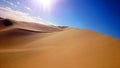 Desert meets blue sky Royalty Free Stock Photo