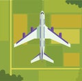 jet airplane flying above green farmlands, top view