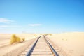 desert railway, dunes, clear blue sky