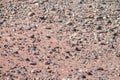 Desert red dry soil and stones texture Royalty Free Stock Photo