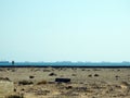 The desert and the red sea in south Sinai city, Ras Sedr Sudr Egypt showing the ships passing from and to Suez canal that connects Royalty Free Stock Photo