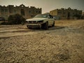 Desert Relic/Old Car rusting away in the desert Royalty Free Stock Photo