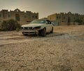 Desert Relic/Old Car rusting away in the desert Royalty Free Stock Photo