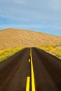 Desert road in Death Valley National Park Royalty Free Stock Photo