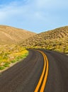 Desert road in Death Valley National Park Royalty Free Stock Photo