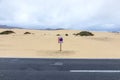 Desert Road in Fuerteventura with parking forbidden sign in the