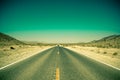 Desert road highway in death valley national park Royalty Free Stock Photo