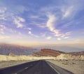 Desert road leading through Death Valley National Park, California USA Royalty Free Stock Photo