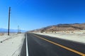 Desert Road in Owens Valley with Sierra Nevada, Eastern California Royalty Free Stock Photo