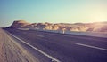 Desert road at sunset, color toning applied, Egypt Royalty Free Stock Photo
