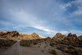 Desert rock formations with snowy mountain range in Eastern Sierra Nevadas California Royalty Free Stock Photo