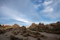 Desert rock formations with snowy mountain range in Eastern Sierra Nevadas California Royalty Free Stock Photo