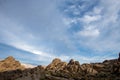 Desert rock formations with snowy mountain range in Eastern Sierra Nevadas California Royalty Free Stock Photo