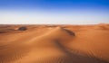 desert sand and dunes with clear blue sky Royalty Free Stock Photo