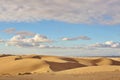 Desert Sand Dunes with Mountains in the Background Royalty Free Stock Photo